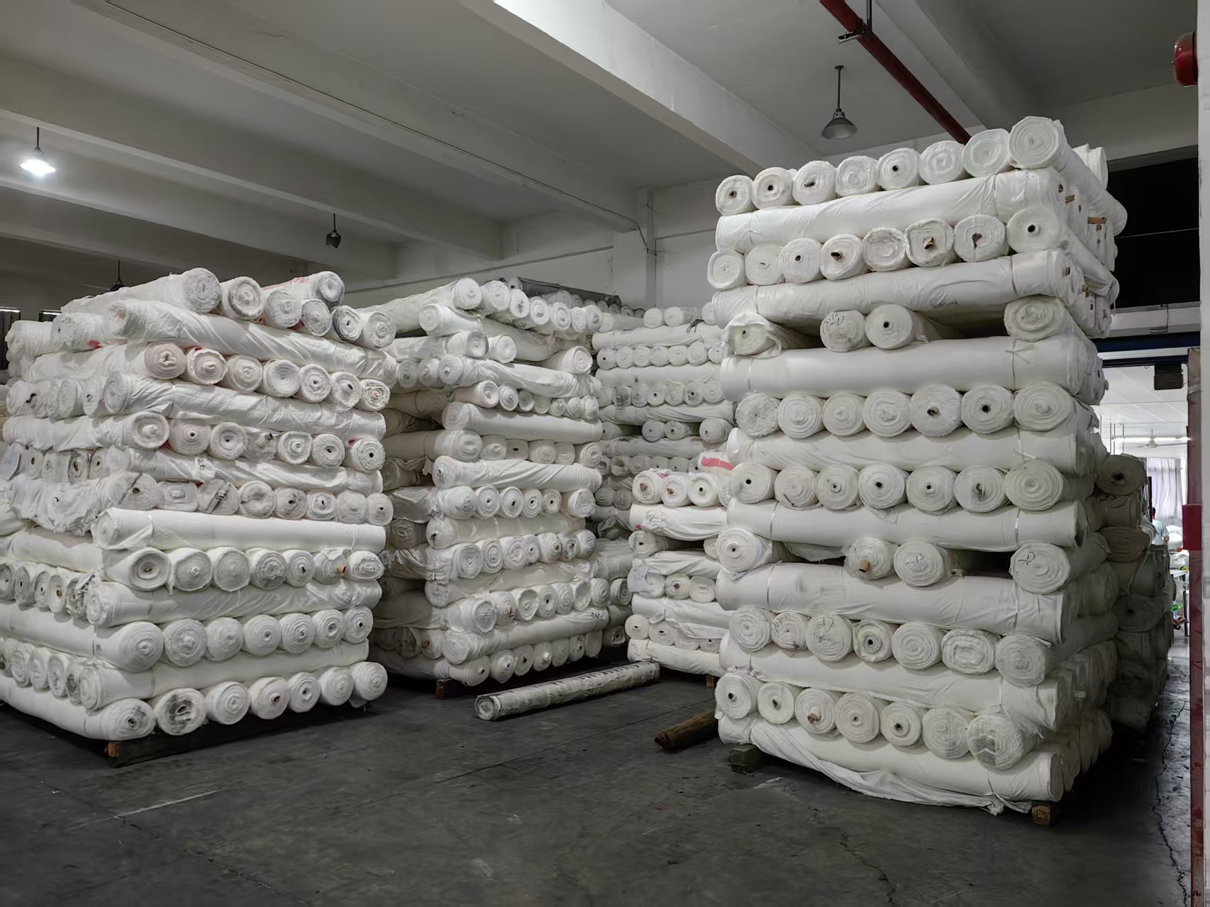 Grey fabric storage area at 푸싱 텍스타일